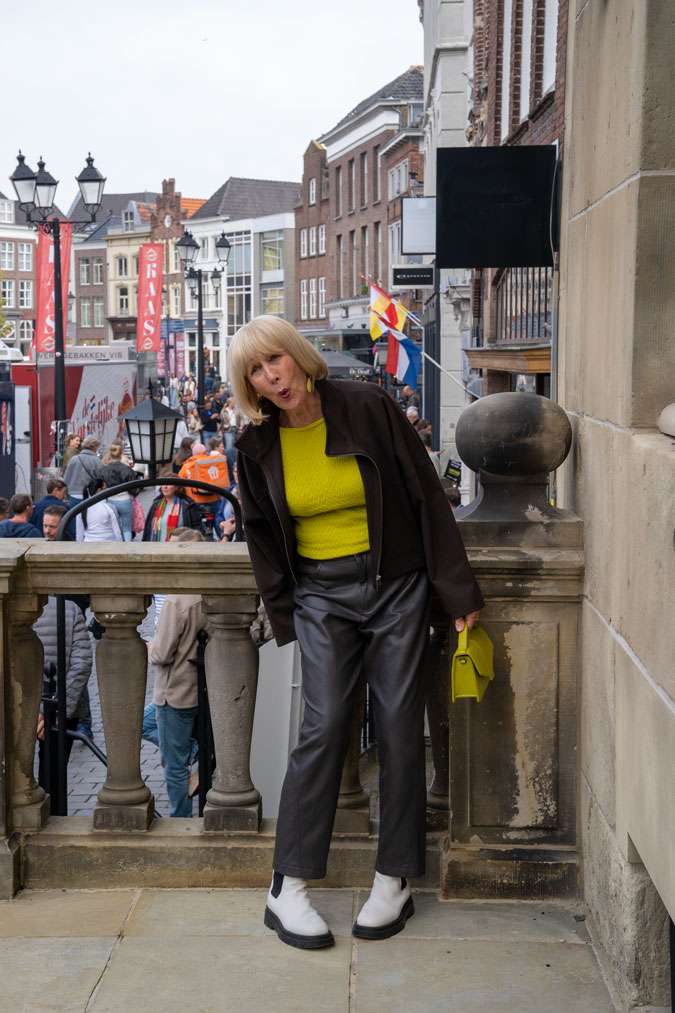 Brown swing jacket with brown vegan leather trousers