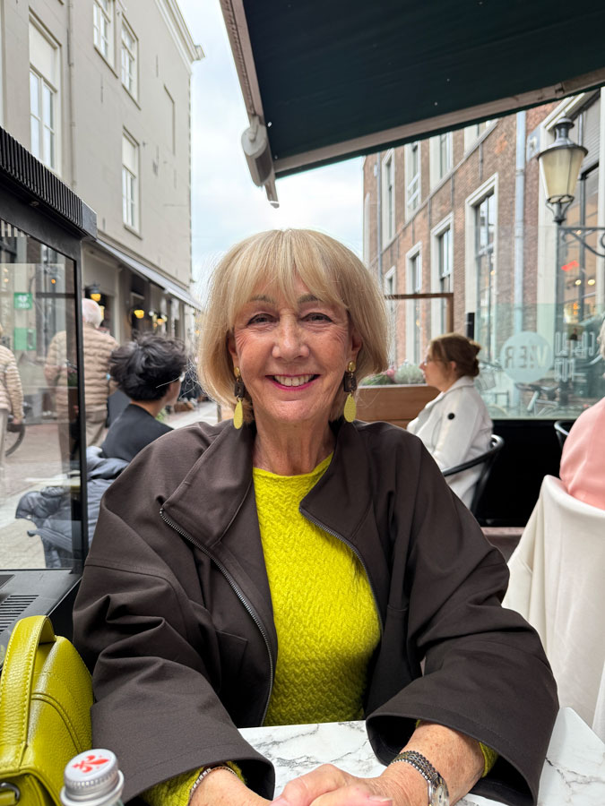 Brown swing jacket with brown vegan leather trousers