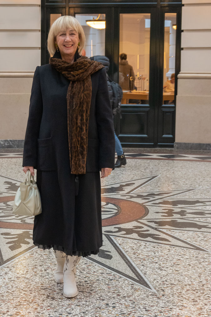 Black coat with leopard scarf