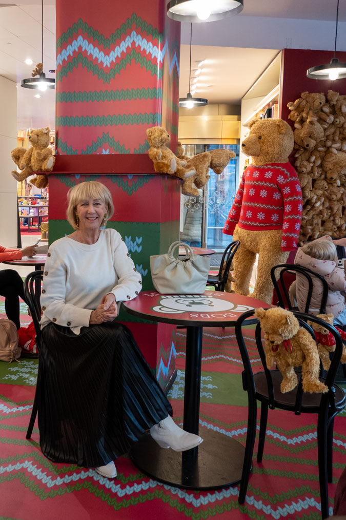 Black pleated skirt with cream jumper