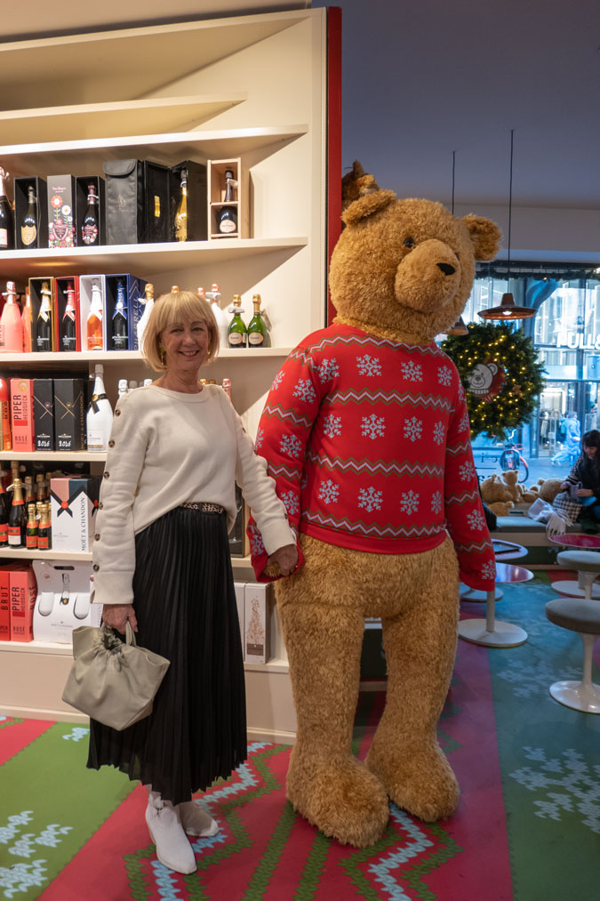 Black pleated skirt with cream jumper