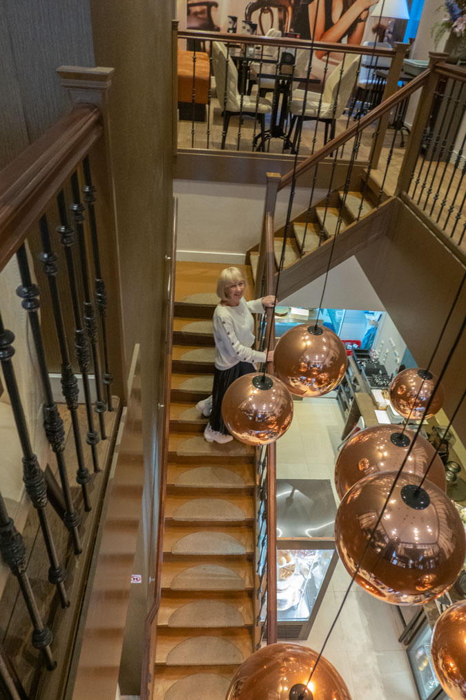 Black pleated skirt with cream jumper