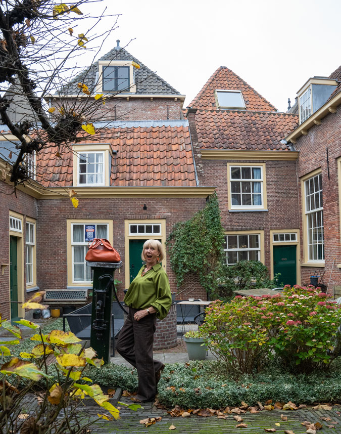 Brown jeans with a green top