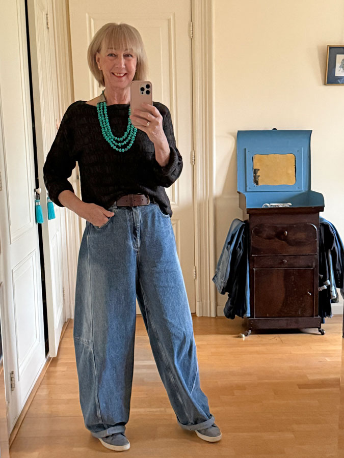 Chocolate brown jumper with turquois necklace and jeans